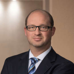 Craig A. Tomlins, Partner