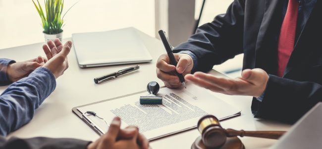 Attorney talking to clients